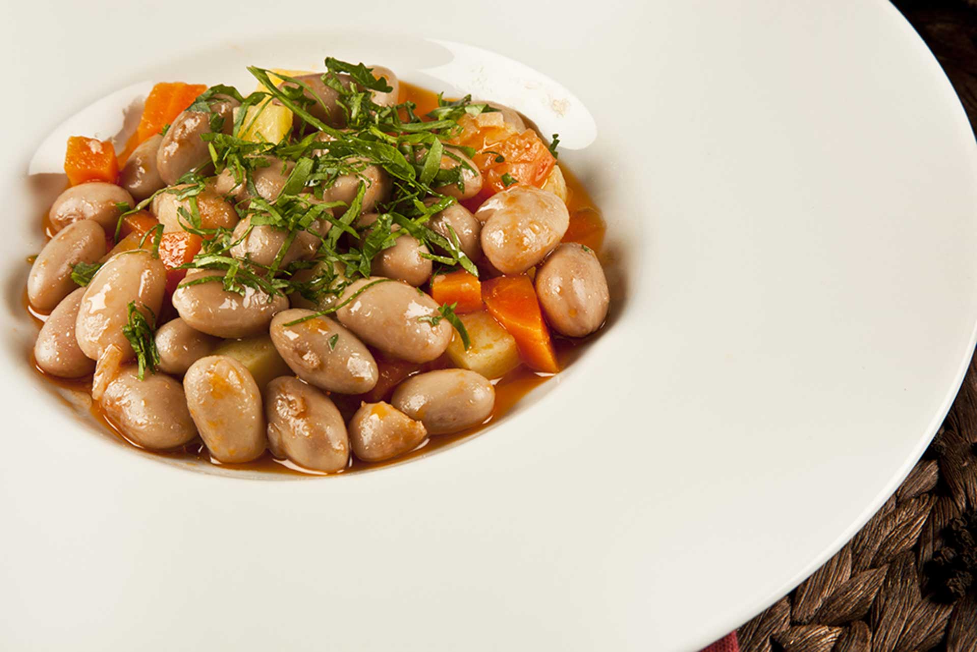 a dish of Turkish kidney beans served on a white plate