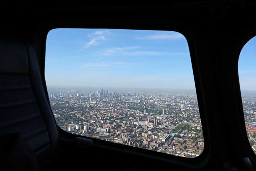 Aerial view of London through small helicopter window