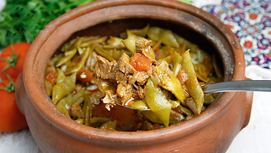 Turkish traditional runner or fresh beans with meat in casserole