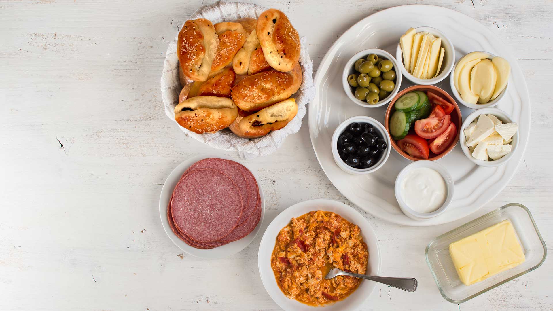 traditional turkish breakfast on white wooden table