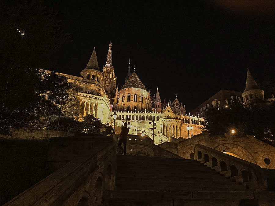 The Fishermen’s Bastion at night, illuminated from below with yellow light