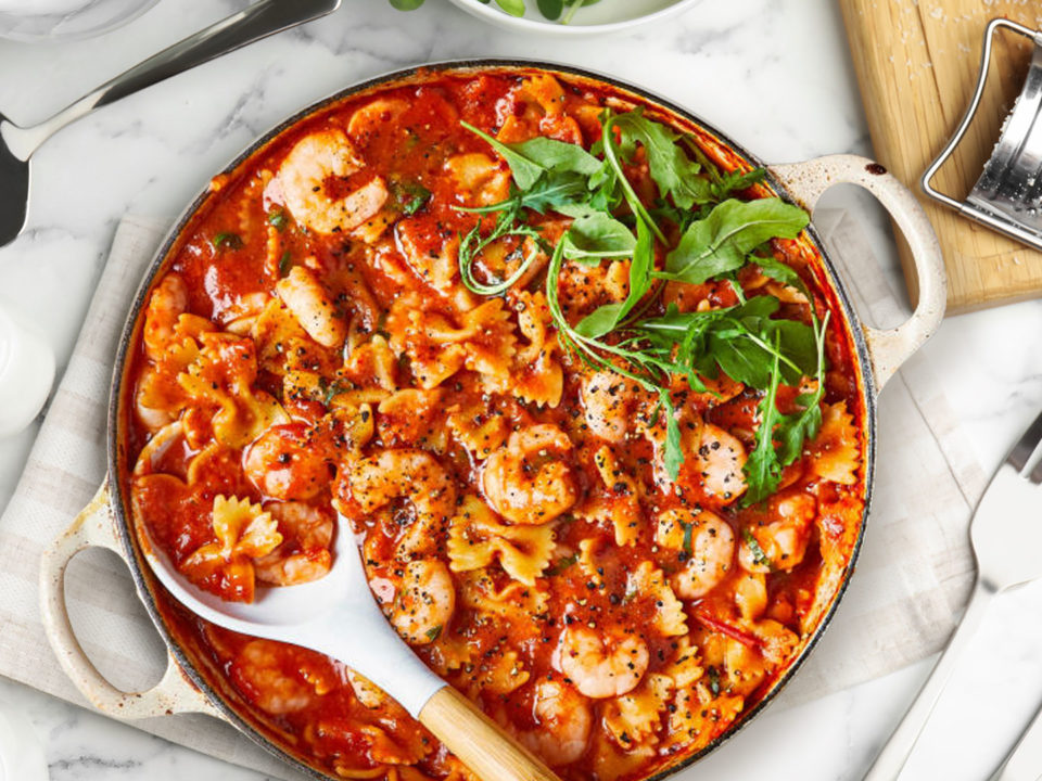 prawn arrabbiata farfalle on plate