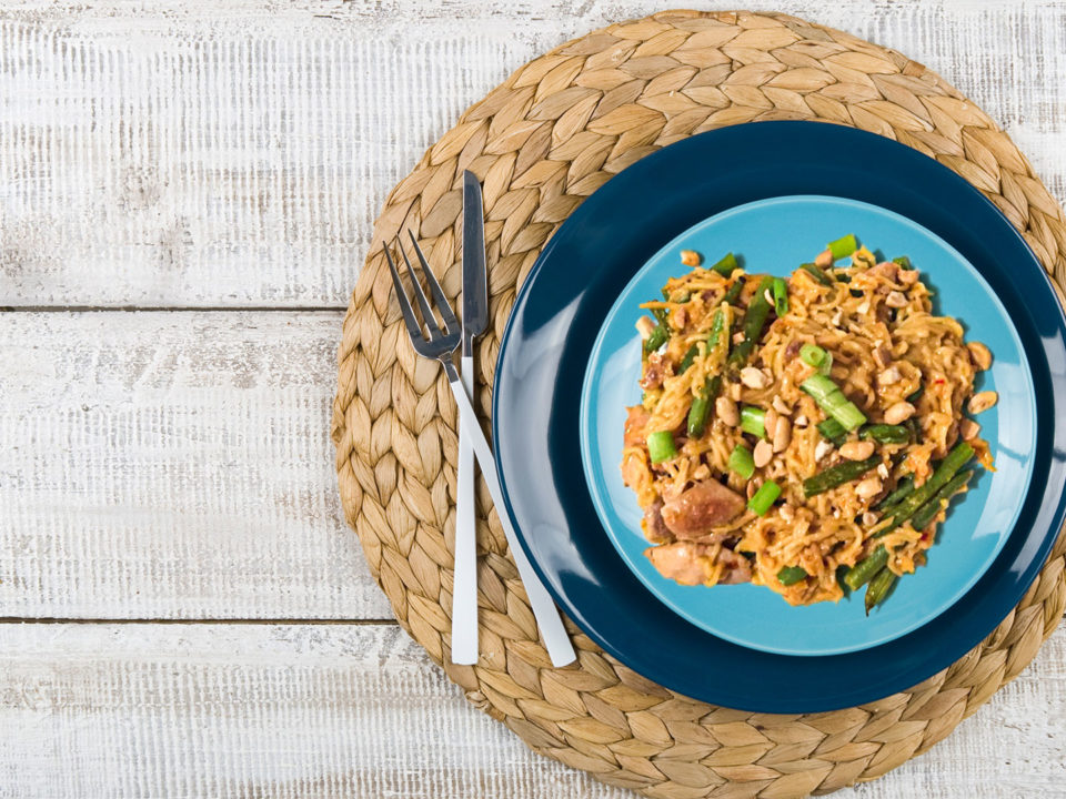 Spicy Peanut Chicken Noodles on blue plate