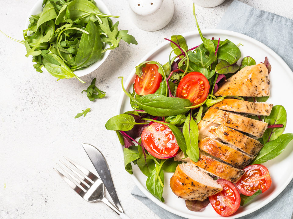 chicken with salad on a plate