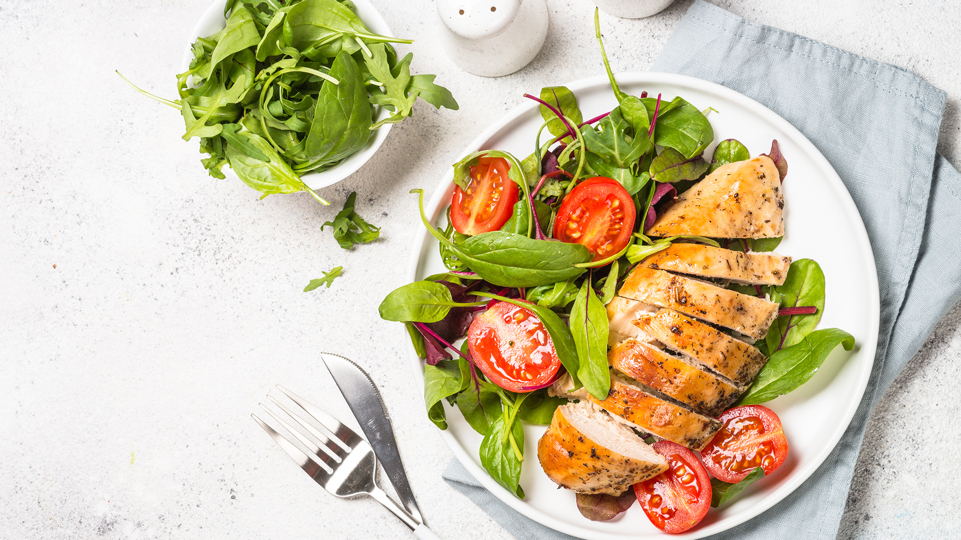 chicken with salad on a plate