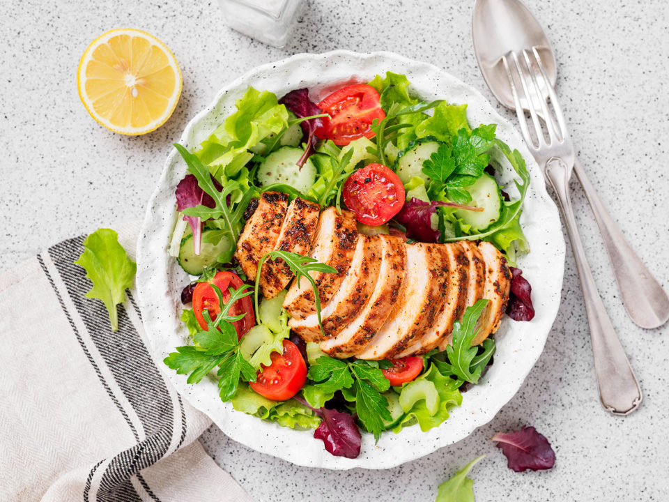 Grilled Chicken with Salad in a white bowl